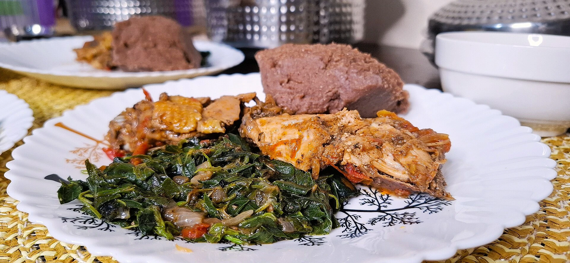 Kenyan meal with vegetables and ugali
