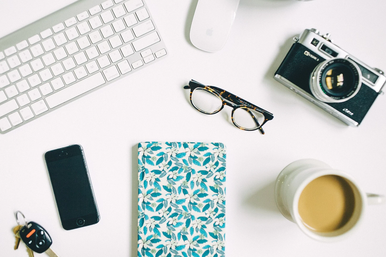 Notebook and coffee used for recording daily observations