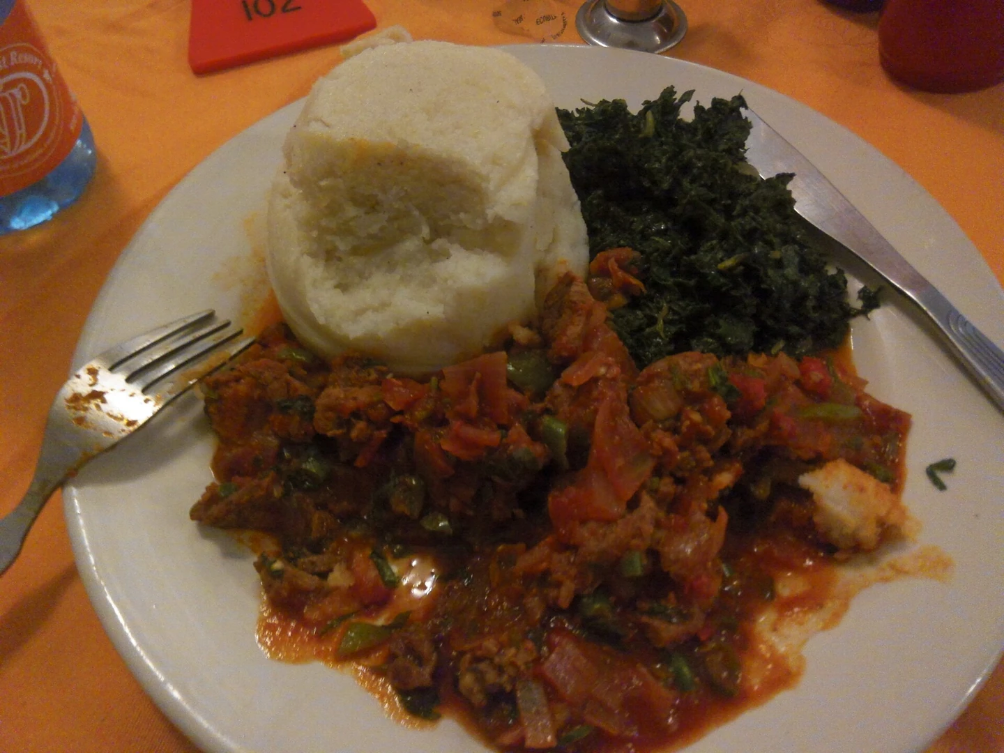 Kenyan ugali served with spinach